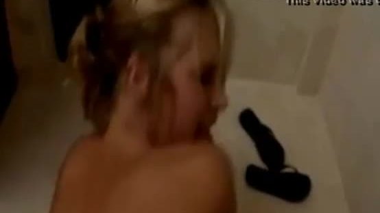 Cute blondie does college blowjob in the bathroom